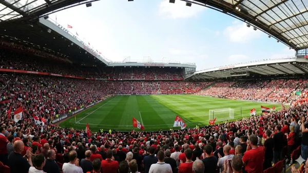 Wall Street Power Play: Leon Cooperman Increases Stake in Manchester United - Picture created by AI