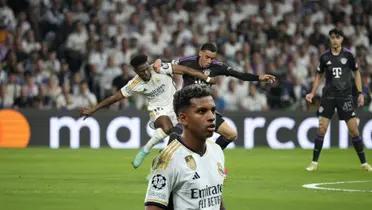 Aurelien Tchouameni and Jamal Musiala fight for the ball while Rodrygo looks on.