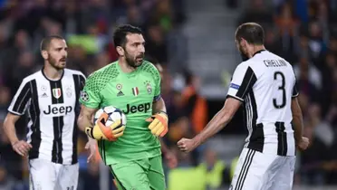 Bonucci, Chiellini and Buffon playing for Juventus. 