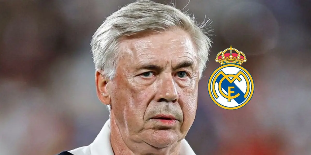 Carlo Ancelotti looks serious while wearing the Real Madrid jacket and the Real Madrid badge is next to him.