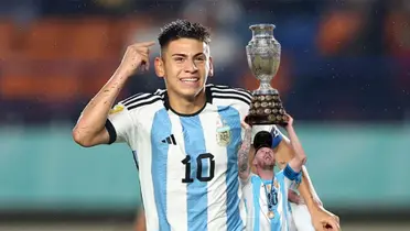 Claudio Echeverri celebrates a goal for a youth team of Argentina as Lionel Messi lifts the Copa America trophy. (Source: Messi Xtra X)