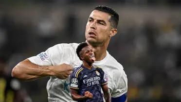 Cristiano Ronaldo pointing at himself while Vinicius Jr celebrated his goal with Real Madrid.