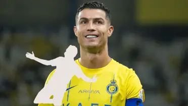 Cristiano Ronaldo smiles while wearing the Al Nassr jersey and the a mystery player is below him. (Source: GOAL)