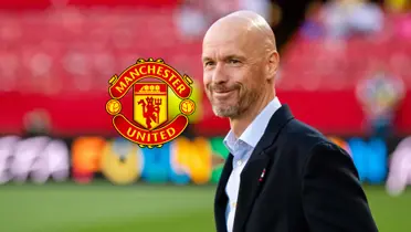 Erik Ten Hag has a big grin on his face as the Manchester United badge is next to him.