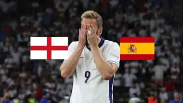 Harry Kane covers his eyes in sadness while the England and the Spain flag is next to him. (Source: iMiaSanMia X)