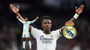 Jude Bellingham does his trademark celebration with his arms out and Vinicius Jr. puts his arms out as a Real Madrid logo is next to him.