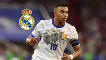 Kylian Mbappé runs with the France jersey and the Real Madrid badge is next to him while the stack of money is below him. (Source: Getty Images)