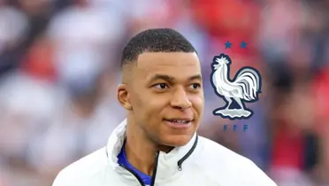 Kylian Mbappé smiles while wearing the French national team jacket and the France national team badge is next to him. (Source: TheEuropeanLad X)