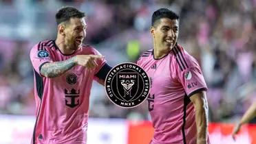 Lionel Messi and Luis Suarez smiling while wearing an Inter Miami kit and the Inter Miami badge is in the middle.