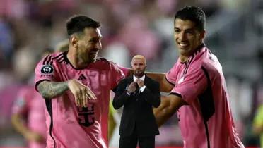 Lionel Messi and Luis Suarez together celebrating an Inter Miami goal while David Beckham looks on.