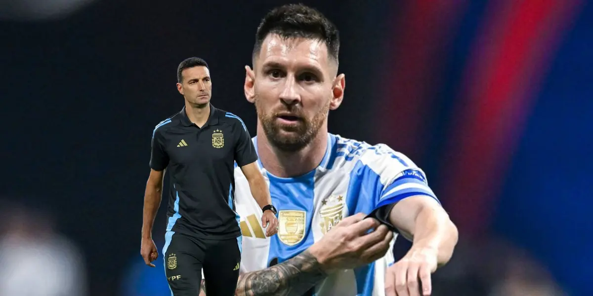 Lionel Messi fixes his armband as the captain while Lionel Scaloni walks with concern on his face. (Source: Getty Images)