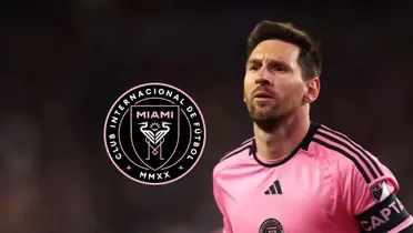 Lionel Messi looks serious wearing an Inter Miami kit while the Inter Miami badge is next to him.