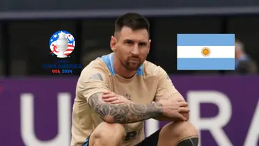 Lionel Messi sits on a football during training while the Copa America logo and the Argentina flag are next to him. (Souce: Messi Xtra X)