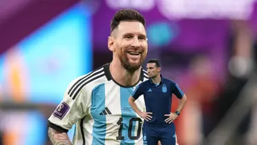 Lionel Messi smiles while wearing the Argentina national team jersey and Lionel Scaloni puts his hands on his hip.