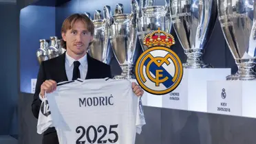 Luka Modric shows the Real Madrid jersey that has his name the year of 2025 and the Real Madrid badge is next to him. (Source: Luka Modric X)