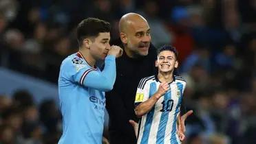 Pep Guardiola and Julian Alvarez discuss with each other during a Manchester City game as Claudio Echeverri celebrates a goal for the U17 Argentina team. (Source: REUTERS)