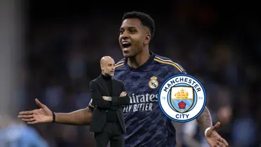 Rodrygo smiles while wearing the Real Madrid jersey and Pep Guardiola crosses his arms; the Man City badge is next to him.