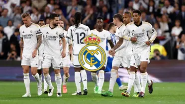 The Real Madrid team all celebrate together after a goal is scored and the Real Madrid badge is in the middle.
