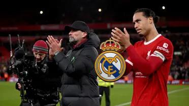 Virgil Van Dijk and Jurgen Klopp clap to the Liverpool fans and the Real Madrid badge is next to them.