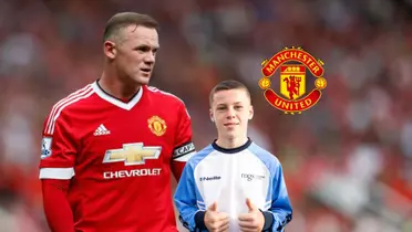 Wayne Rooney looks to the side while wearing the Man United jersey as his son Kai Rooney throws two thumbs up and the club logo is near them. (Source: Sky Sports, Gothia Cup)