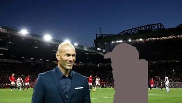 Zinedine Zidane smiling with the background of Manchester United's stadium Old Trafford.