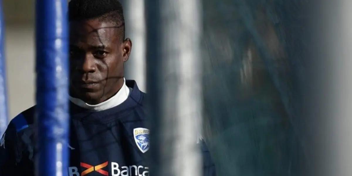 Balotelli visited the Scampia neighborhood on the outskirts of Naples, where he was photographed with two mafia bosses