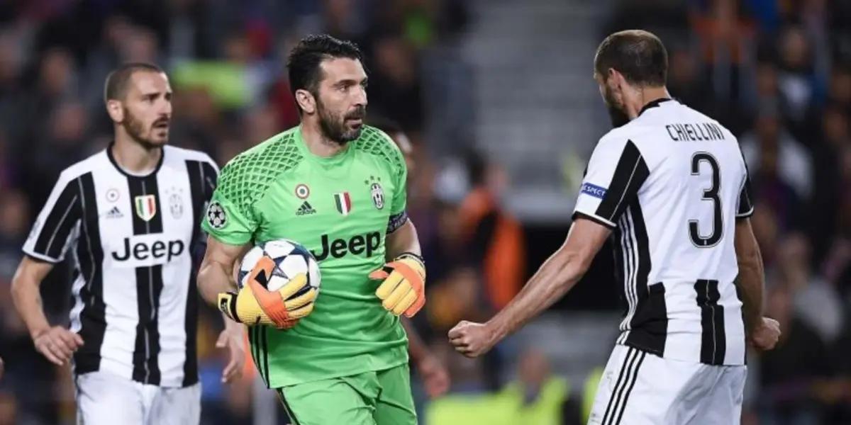 Bonucci, Chiellini and Buffon playing for Juventus.