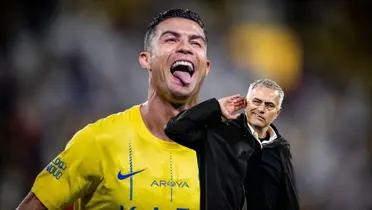 Cristiano Ronaldo celebrates his Al Nassr goal while Jose Mourinho puts his hand up to his ear.