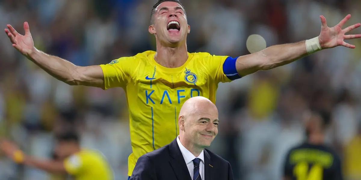 Cristiano Ronaldo screams with joy and with his arms out; the FIFA President, Gianni Infantino, smiles.