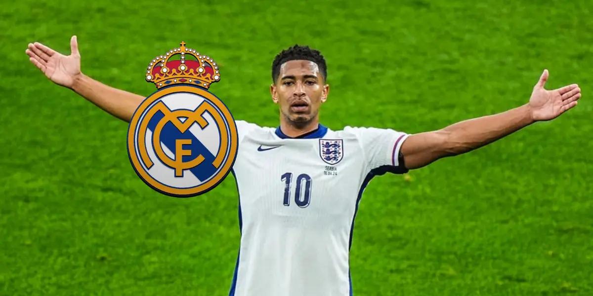 Jude Bellingham does his trademark celebration with the England jersey on and the Real Madrid badge is next to him.