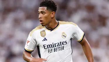 Jude Bellingham runs with the Real Madrid jersey on.