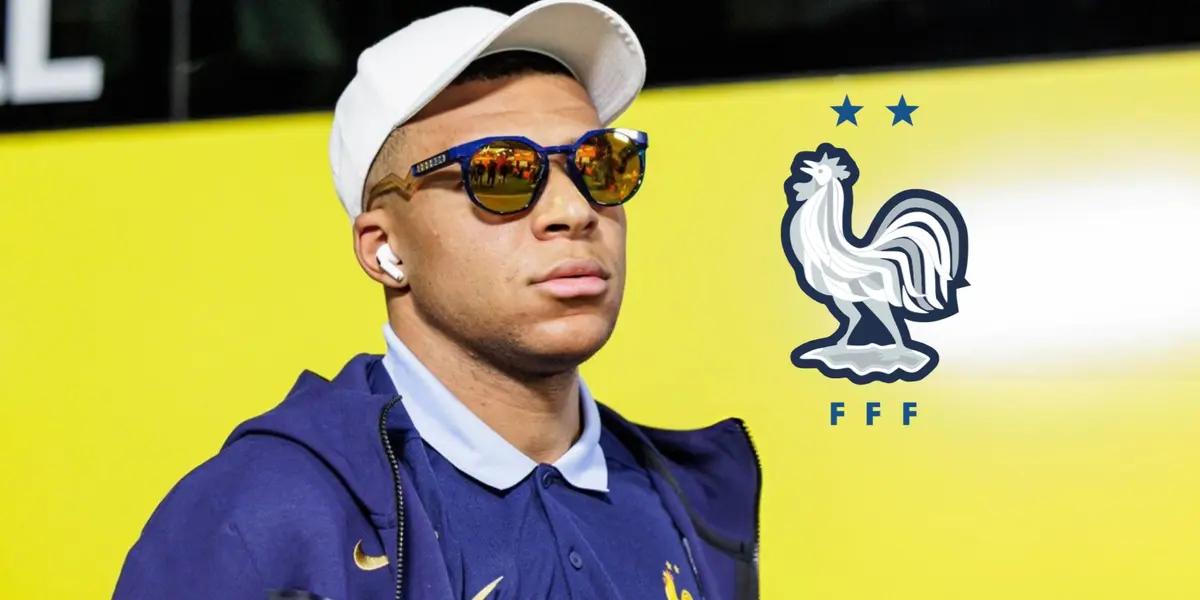 Kylian Mbappé looks serious while wearing sunglasses and the French national team badge is next to him.