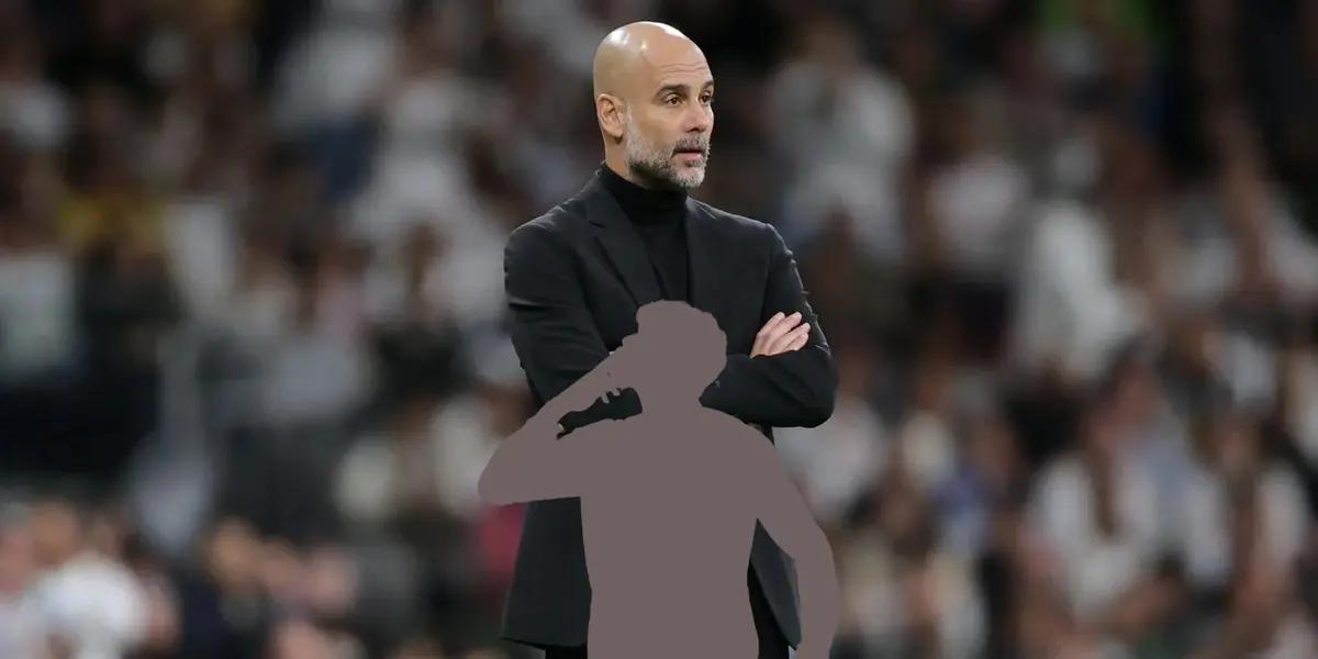 Pep Guardiola focused as the coach of Manchester City.