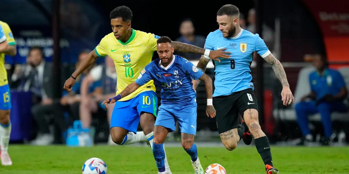 Rodrygo dribbles with the ball against Uruguay's Nahitan Nandez while Neymar dribbles with the ball in an Al Hilal jersey. (Source: Lucas Peltier-USA TODAY Sports, Al Hilal X)