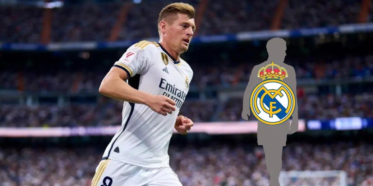 Toni Kroos runs while wearing the Real Madrid jersey and a mystery player has the Real Madrid badge.