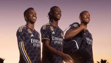 Vinicius Jr., Eduardo Camavinga and David Alaba with the Real Madrid jerseys on.