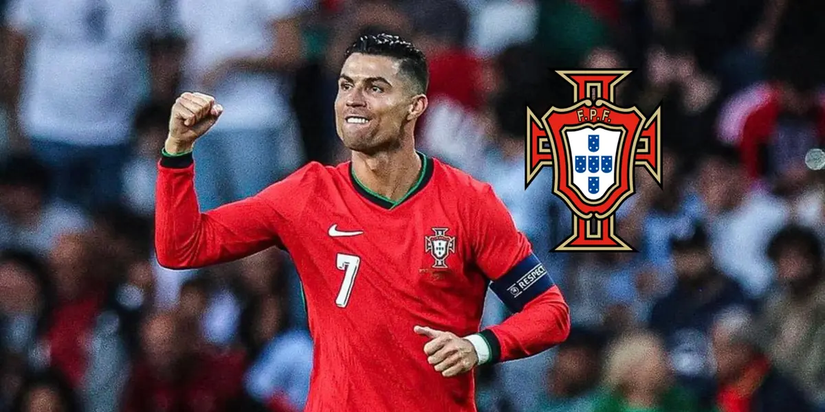 Cristiano Ronaldo is happy as he puts his fist in the air and wears the Portugal national team jersey; the Portugal national team badge.