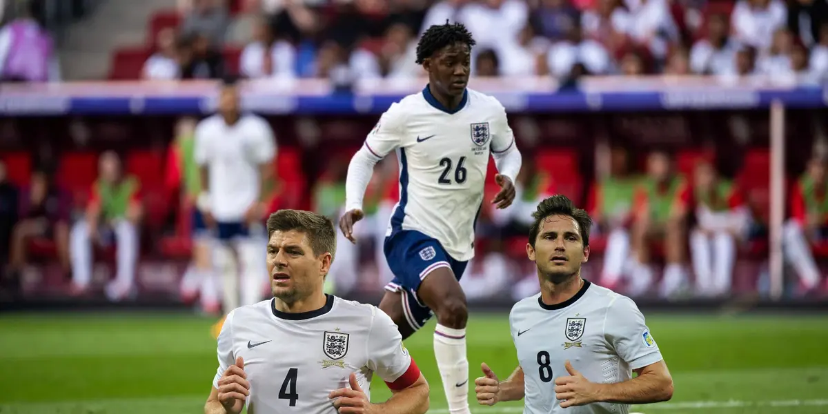 Kobbie Mainoo goes for the ball with England at the EUROS 2024 while Steven Gerrard and Frank Lampard is below him. (Source: Getty Images)