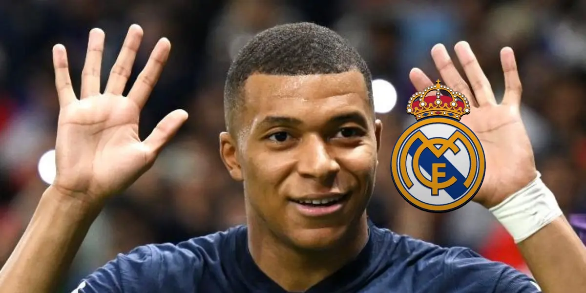 Kylian Mbappé puts his hands up while wearing a France kit and a Real Madrid logo is next to him.