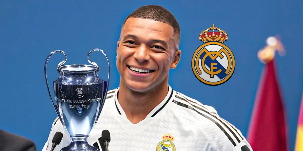 Kylian Mbappé smiles at the Real Madrid presentation while the club badge and the Champions League trophy is right next to him. (Source: UEFA, Real Madrid X) 