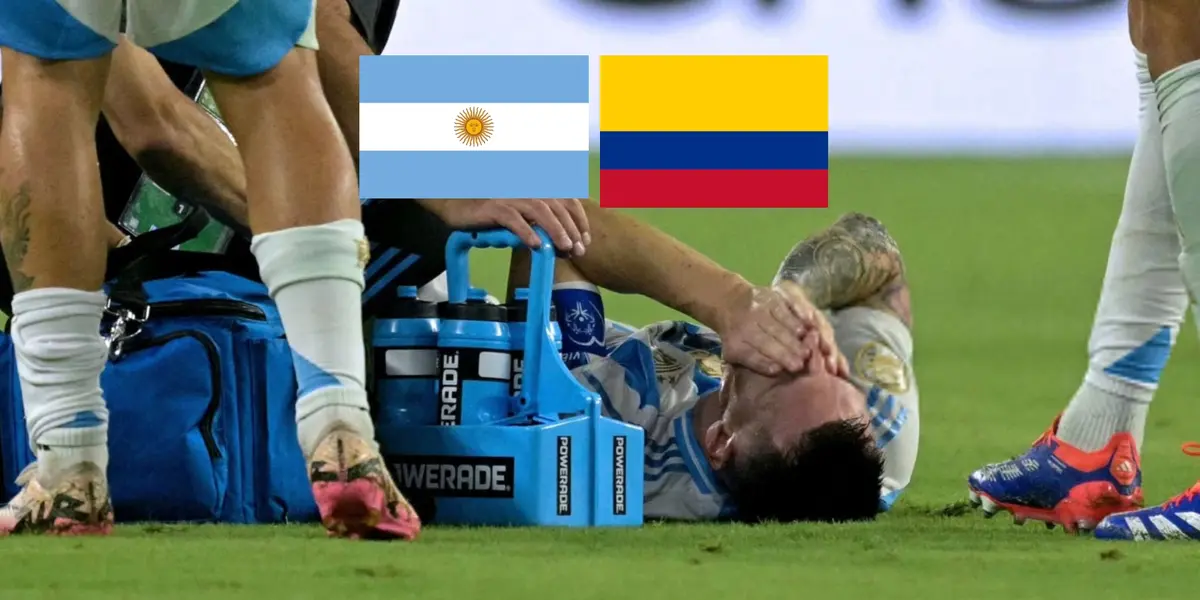 Lionel Messi cries on the pitch on the ground in pain in the Copa America final with the Argentina and Colombia flags above him. (Source: Messi Xtra X)