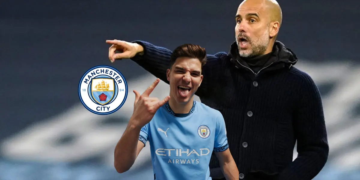 Pep Guardiola points to the pitch while Julian Alvarez does his celebration with the new Man City kit and the club badge is next to him. (Source: AP, City Report X)