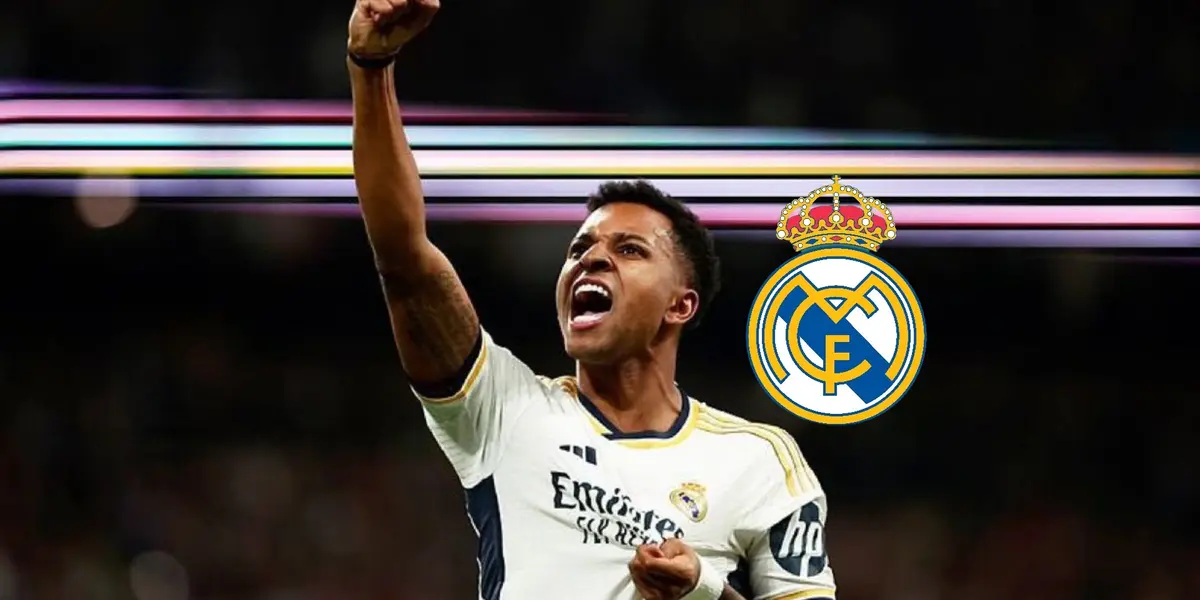 Rodrygo celebrates his goal by having a fist in the air and hold on the Real Madrid crest on his jersey; the Real Madrid badge is next to him.