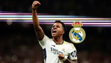 Rodrygo celebrates his goal by having a fist in the air and hold on the Real Madrid crest on his jersey; the Real Madrid badge is next to him.