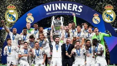 The Real Madrid team celebrate the Champions League trophy as Nacho Fernandez lifts the trophy.